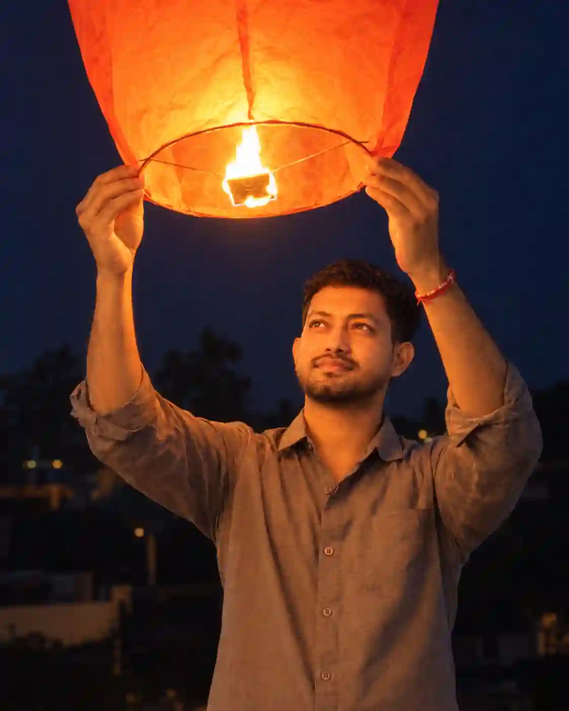 boy diwali flying lantern